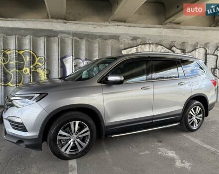 Серый Хонда Пилот, объемом двигателя 3 л и пробегом 125 тыс. км за 23000 $, фото 1 на Automoto.ua