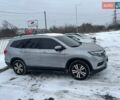 Серый Хонда Пилот, объемом двигателя 3 л и пробегом 145 тыс. км за 23999 $, фото 1 на Automoto.ua