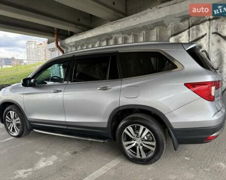 Серый Хонда Пилот, объемом двигателя 3 л и пробегом 125 тыс. км за 23000 $, фото 5 на Automoto.ua