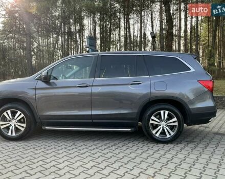 Серый Хонда Пилот, объемом двигателя 3.47 л и пробегом 184 тыс. км за 19500 $, фото 3 на Automoto.ua