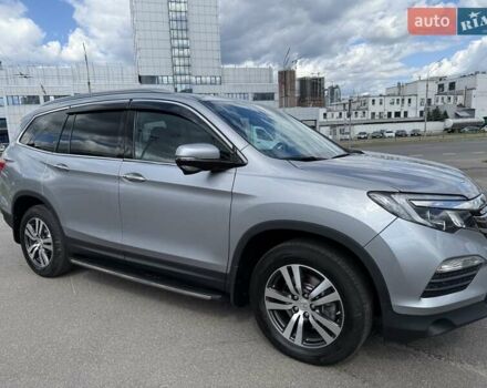 Серый Хонда Пилот, объемом двигателя 3 л и пробегом 125 тыс. км за 23500 $, фото 1 на Automoto.ua