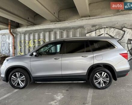 Серый Хонда Пилот, объемом двигателя 3 л и пробегом 125 тыс. км за 23000 $, фото 2 на Automoto.ua