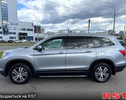 Серый Хонда Пилот, объемом двигателя 3 л и пробегом 125 тыс. км за 22800 $, фото 1 на Automoto.ua