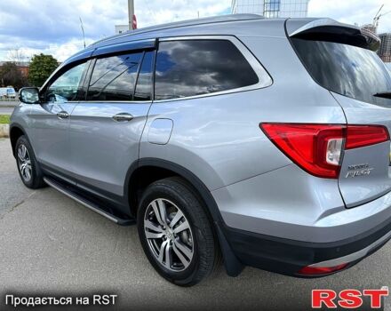 Серый Хонда Пилот, объемом двигателя 3 л и пробегом 125 тыс. км за 22800 $, фото 2 на Automoto.ua