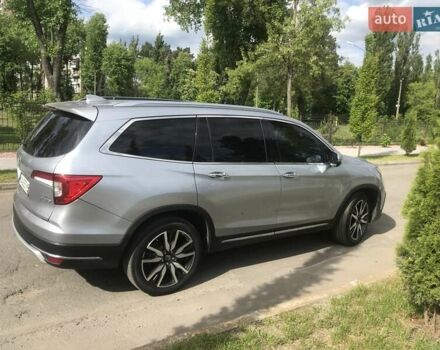 Серый Хонда Пилот, объемом двигателя 3.47 л и пробегом 91 тыс. км за 28000 $, фото 3 на Automoto.ua