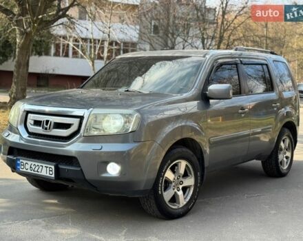 Серый Хонда Пилот, объемом двигателя 3.47 л и пробегом 232 тыс. км за 9350 $, фото 1 на Automoto.ua