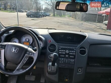 Серый Хонда Пилот, объемом двигателя 3.47 л и пробегом 123 тыс. км за 15900 $, фото 1 на Automoto.ua