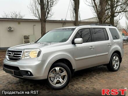 Сірий Хонда Пілот, об'ємом двигуна 3.5 л та пробігом 185 тис. км за 12700 $, фото 1 на Automoto.ua