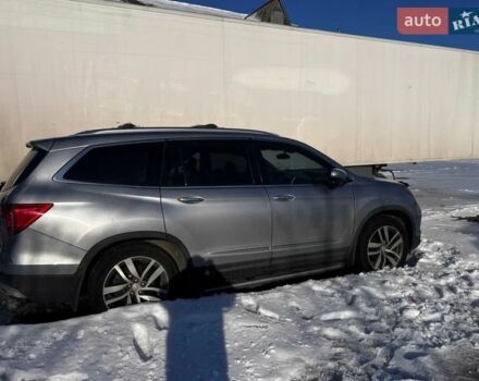 Серый Хонда Пилот, объемом двигателя 3.47 л и пробегом 165 тыс. км за 14000 $, фото 1 на Automoto.ua