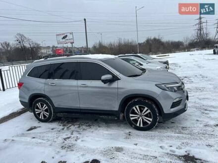 Сірий Хонда Пілот, об'ємом двигуна 3 л та пробігом 145 тис. км за 23999 $, фото 1 на Automoto.ua