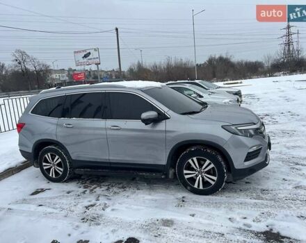 Серый Хонда Пилот, объемом двигателя 3 л и пробегом 145 тыс. км за 23999 $, фото 1 на Automoto.ua