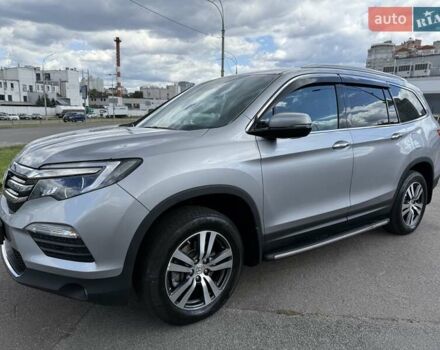 Серый Хонда Пилот, объемом двигателя 3 л и пробегом 125 тыс. км за 23500 $, фото 1 на Automoto.ua