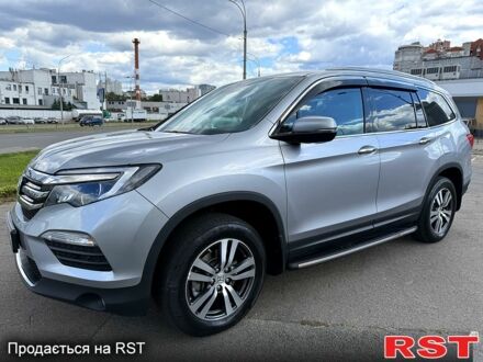 Серый Хонда Пилот, объемом двигателя 3 л и пробегом 125 тыс. км за 22800 $, фото 1 на Automoto.ua