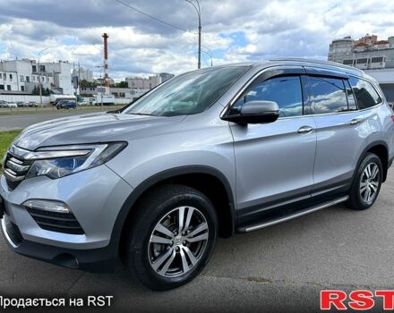 Серый Хонда Пилот, объемом двигателя 3 л и пробегом 125 тыс. км за 22800 $, фото 1 на Automoto.ua