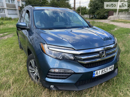 Синий Хонда Пилот, объемом двигателя 3.5 л и пробегом 106 тыс. км за 19800 $, фото 1 на Automoto.ua