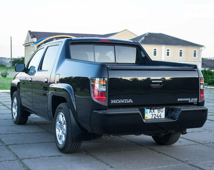 Черный Хонда Риджлайн, объемом двигателя 3.5 л и пробегом 130 тыс. км за 13500 $, фото 10 на Automoto.ua