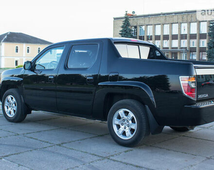 Черный Хонда Риджлайн, объемом двигателя 3.5 л и пробегом 130 тыс. км за 13500 $, фото 11 на Automoto.ua