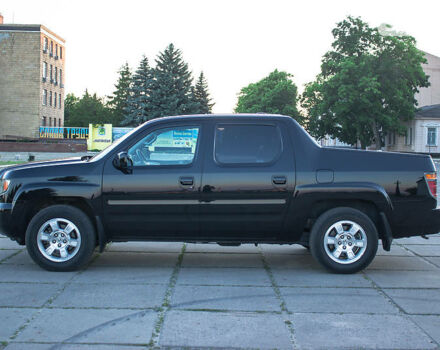 Черный Хонда Риджлайн, объемом двигателя 3.5 л и пробегом 130 тыс. км за 13500 $, фото 14 на Automoto.ua