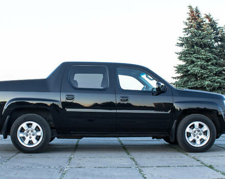 Черный Хонда Риджлайн, объемом двигателя 3.5 л и пробегом 130 тыс. км за 13500 $, фото 6 на Automoto.ua