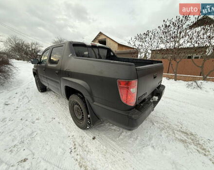 Черный Хонда Риджлайн, объемом двигателя 3.5 л и пробегом 260 тыс. км за 4700 $, фото 2 на Automoto.ua