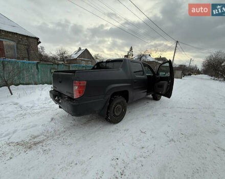 Черный Хонда Риджлайн, объемом двигателя 3.5 л и пробегом 260 тыс. км за 4700 $, фото 4 на Automoto.ua