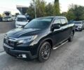 Чорний Хонда Ріджлайн, об'ємом двигуна 3.5 л та пробігом 75 тис. км за 16000 $, фото 1 на Automoto.ua