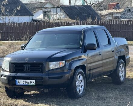 Черный Хонда Риджлайн, объемом двигателя 3.5 л и пробегом 198 тыс. км за 5500 $, фото 1 на Automoto.ua