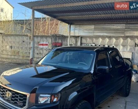 Черный Хонда Риджлайн, объемом двигателя 3.5 л и пробегом 303 тыс. км за 13500 $, фото 1 на Automoto.ua