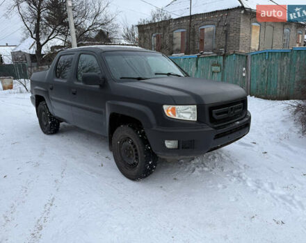 Черный Хонда Риджлайн, объемом двигателя 3.5 л и пробегом 260 тыс. км за 4700 $, фото 1 на Automoto.ua