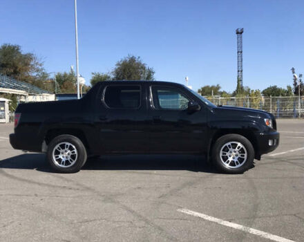 Черный Хонда Риджлайн, объемом двигателя 3.47 л и пробегом 200 тыс. км за 23000 $, фото 1 на Automoto.ua