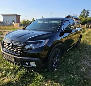 Чорний Хонда Ріджлайн, об'ємом двигуна 3.5 л та пробігом 160 тис. км за 23000 $, фото 1 на Automoto.ua