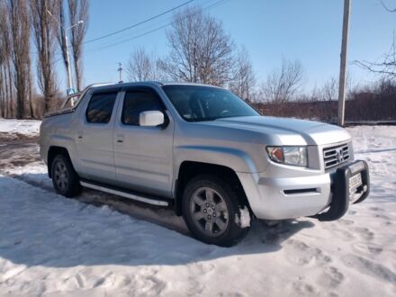 Сірий Хонда Ріджлайн, об'ємом двигуна 3.5 л та пробігом 230 тис. км за 13900 $, фото 1 на Automoto.ua