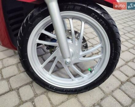 Красный Хонда SH 150, объемом двигателя 0.15 л и пробегом 19 тыс. км за 3077 $, фото 1 на Automoto.ua