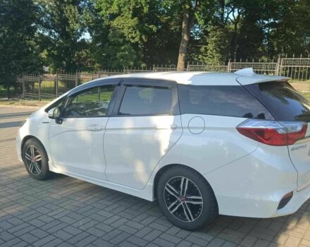 Белый Хонда Шатл, объемом двигателя 1.5 л и пробегом 68 тыс. км за 13000 $, фото 4 на Automoto.ua