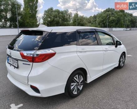 Белый Хонда Шатл, объемом двигателя 1.5 л и пробегом 90 тыс. км за 13800 $, фото 2 на Automoto.ua