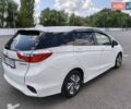 Белый Хонда Шатл, объемом двигателя 1.5 л и пробегом 90 тыс. км за 13800 $, фото 2 на Automoto.ua