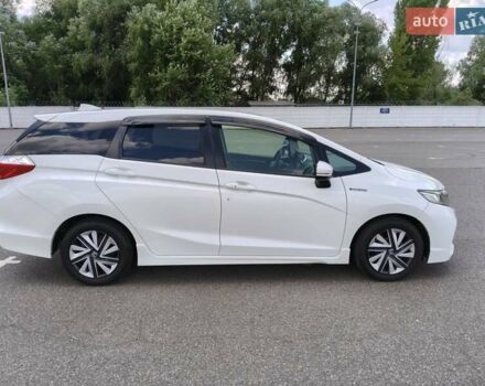 Белый Хонда Шатл, объемом двигателя 1.5 л и пробегом 90 тыс. км за 13800 $, фото 1 на Automoto.ua