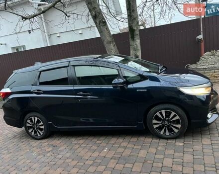 Синий Хонда Шатл, объемом двигателя 1.5 л и пробегом 53 тыс. км за 13300 $, фото 72 на Automoto.ua