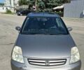 Бежевий Хонда Стрім, об'ємом двигуна 2 л та пробігом 240 тис. км за 5500 $, фото 1 на Automoto.ua