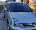 Бежевый Хонда Стрим, объемом двигателя 2 л и пробегом 299 тыс. км за 3700 $, фото 1 на Automoto.ua