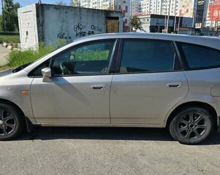 Бежевий Хонда Стрім, об'ємом двигуна 2 л та пробігом 240 тис. км за 5500 $, фото 1 на Automoto.ua
