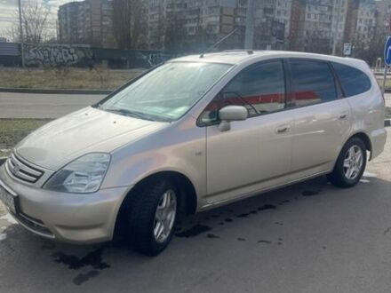 Бежевий Хонда Стрім, об'ємом двигуна 2 л та пробігом 320 тис. км за 3600 $, фото 1 на Automoto.ua