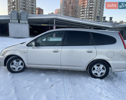 Бежевий Хонда Стрім, об'ємом двигуна 2 л та пробігом 321 тис. км за 3999 $, фото 1 на Automoto.ua