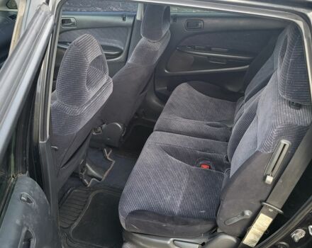 Чорний Хонда Стрім, об'ємом двигуна 1.7 л та пробігом 390 тис. км за 3900 $, фото 7 на Automoto.ua