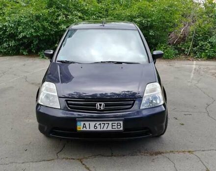 Черный Хонда Стрим, объемом двигателя 2 л и пробегом 212 тыс. км за 4500 $, фото 1 на Automoto.ua