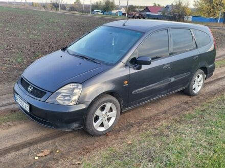 Чорний Хонда Стрім, об'ємом двигуна 1.7 л та пробігом 390 тис. км за 3900 $, фото 1 на Automoto.ua