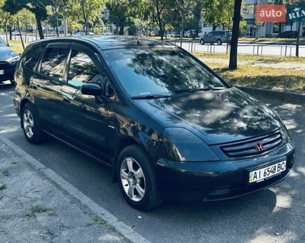 Черный Хонда Стрим, объемом двигателя 2 л и пробегом 299 тыс. км за 4250 $, фото 1 на Automoto.ua