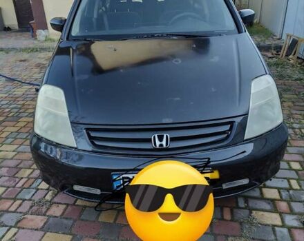 Черный Хонда Стрим, объемом двигателя 2 л и пробегом 305 тыс. км за 3800 $, фото 1 на Automoto.ua