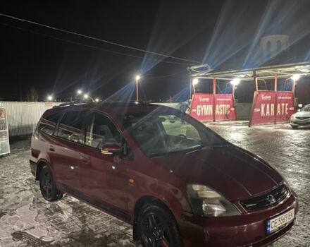 Червоний Хонда Стрім, об'ємом двигуна 2 л та пробігом 255 тис. км за 4000 $, фото 1 на Automoto.ua