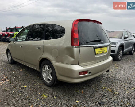 Жовтий Хонда Стрім, об'ємом двигуна 2 л та пробігом 320 тис. км за 3900 $, фото 2 на Automoto.ua